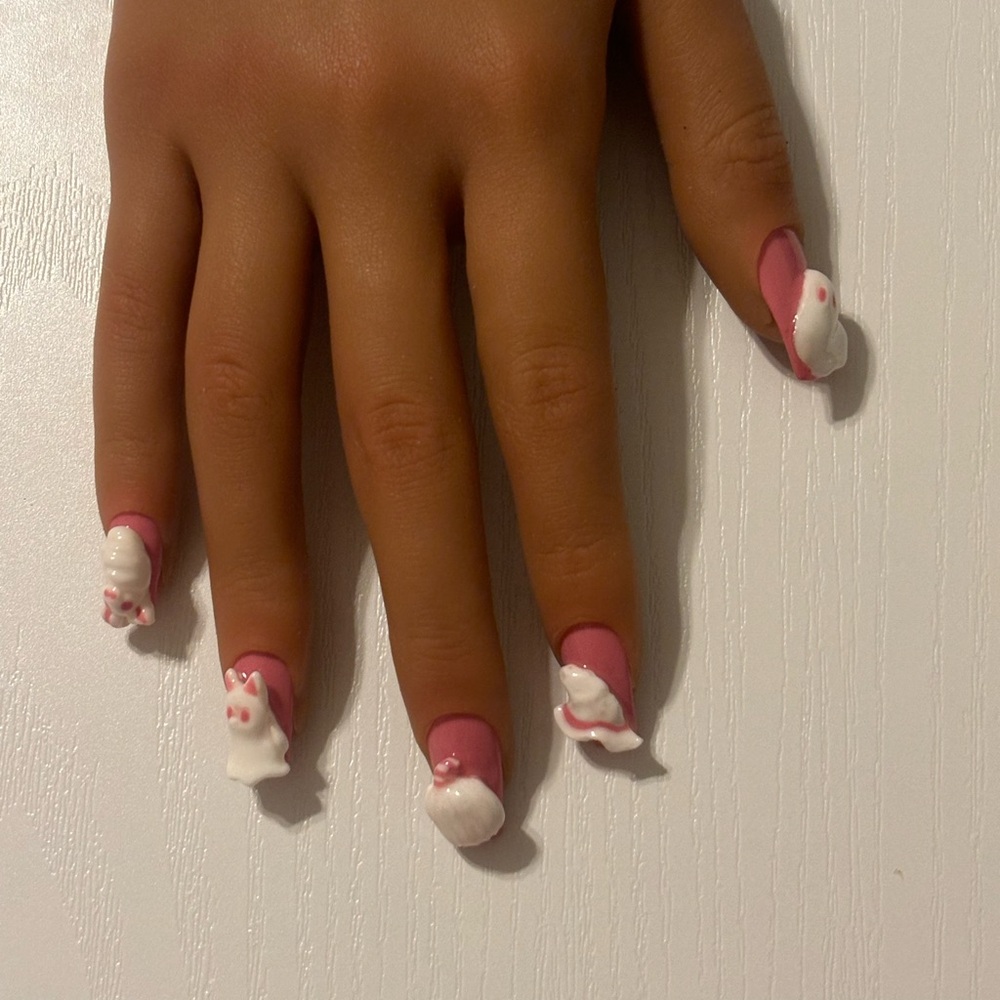 Pink and white Halloween themed nails